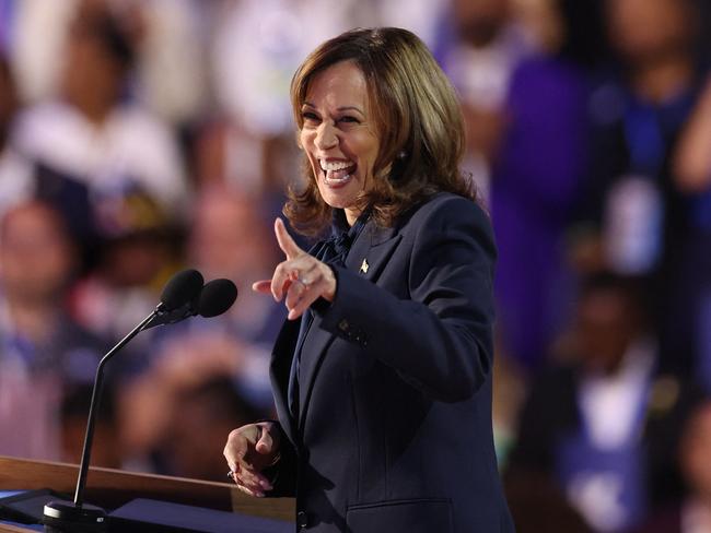 US Vice President and 2024 Democratic presidential candidate Kamala Harris speaks on the fourth and last day of the Democratic National Convention (DNC) at the United Center in Chicago, Illinois, on August 22, 2024. Vice President Kamala Harris will formally accept the partyâs nomination for president today at the DNC which ran from August 19-22 in Chicago. (Photo by CHARLY TRIBALLEAU / AFP)