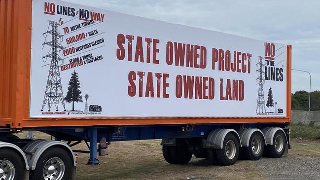 Mary Valley Action Group hung a sign over a semi-trailer in protest of the construction of possible transmission lines to connect the pumped hydro project at Borumba Dam to the state grid. Picture: Facebook