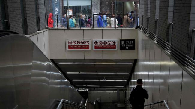 People queue to be tested for Covid-19 in Beijing last week. Picture: AFP