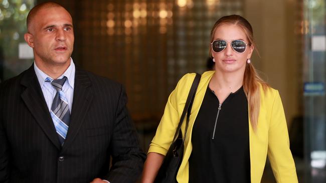 Lauryn Eagle leaves court with lawyer Adam Houda. Picture: Toby Zerna