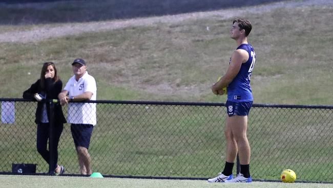 The recovering Tom Hawkins stands and watches training at Southport Sharks. Picture: Sarah Reed