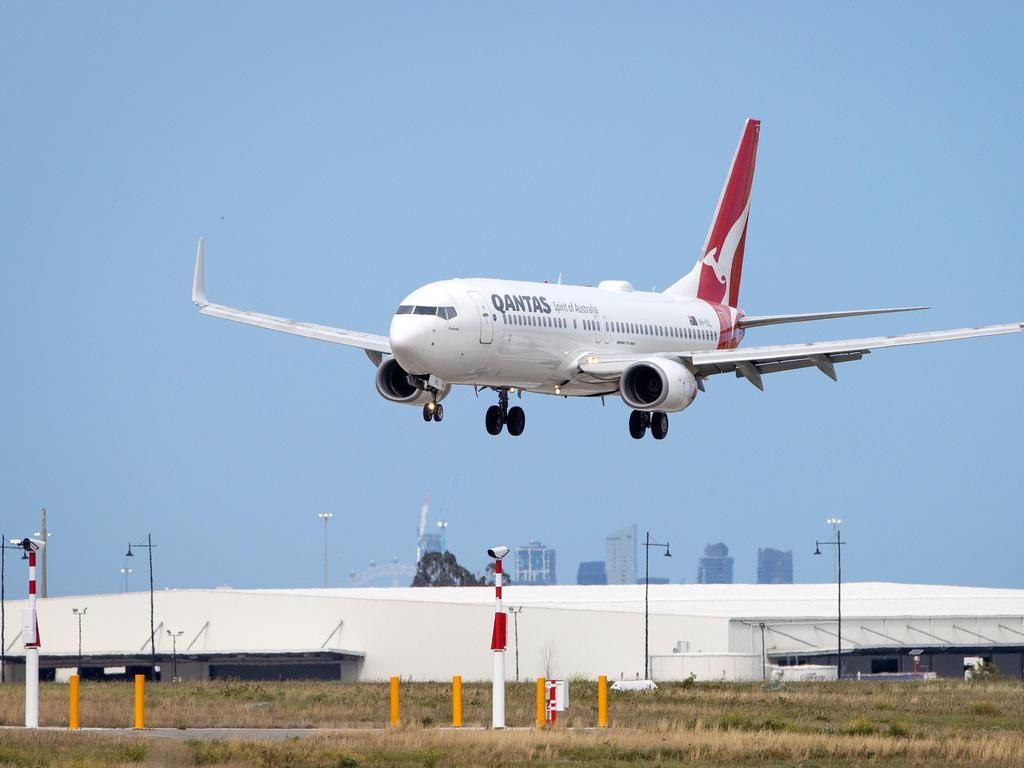 A Qantas plane lands at Tullamarine Airport, Melbourne. Picture: Mark Stewart