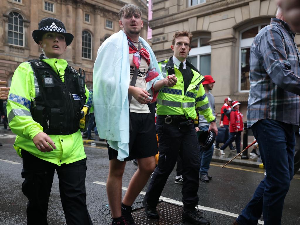 Emergency services help a man injured in the incident. Picture: Getty Images