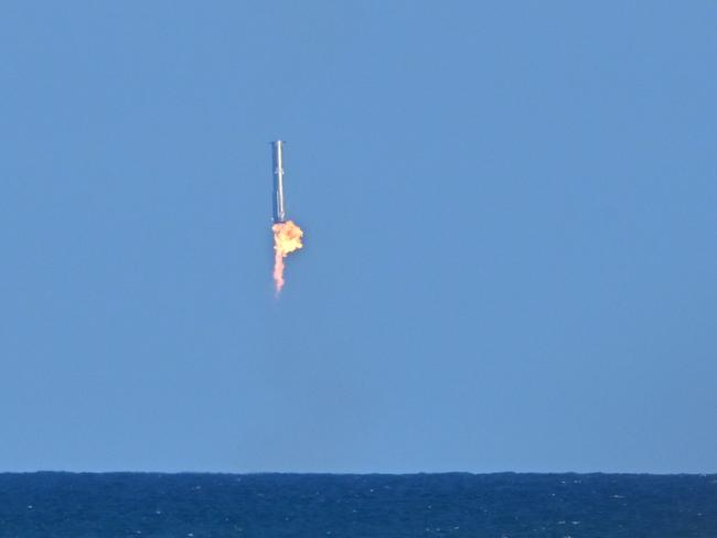 Starship's Super Heavy Booster approaches for a splashdown water landing off the coast of, Texas. Picture: AFP