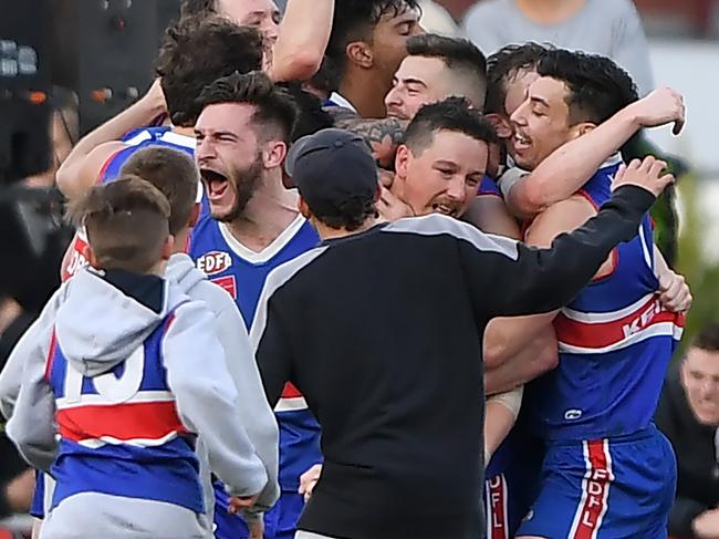 Keilor players and supporters are all smiles. Picture: Andy Brownbill