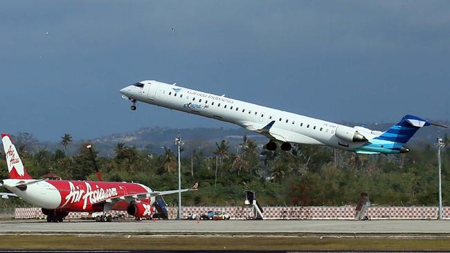 Garuda indonesia aircraft take off from Ngurah Rai International Airport on saturday. The Airport reopens on saturday after temporary closure since thursday night due to volcanic ash of Mount Raung.