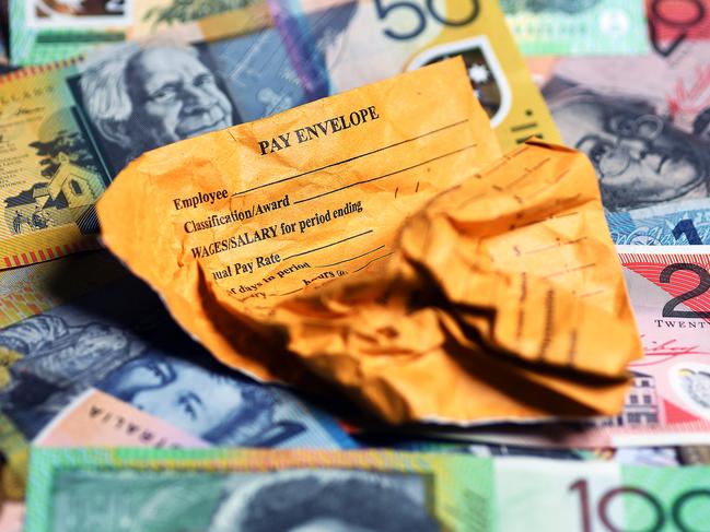 A stock photograph of a wages envelope and Australian currency on the Gold Coast, Thursday, February 22, 2018. Figures released by the Australian Bureau of Statistics showed private sector wages grew by 1.9 per cent in the year to December. (AAP Image/Dave Hunt) NO ARCHIVING