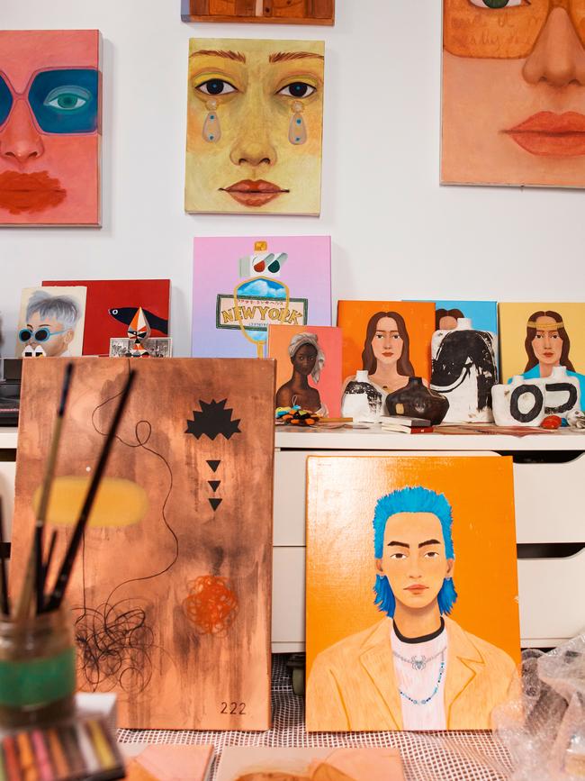 Clockwise from left, 222 (2021), Portrait of G Dragon (2016), art school study (2021), close-up face studies, Self Portrait series (2023) produced for 10 magazine in collaboration with Cartier, Ceramic Study (2020), Blue Mullet (2022), HSC painting (2026) all by Camille Olsen-Ormandy. Picture: Michael Comninus