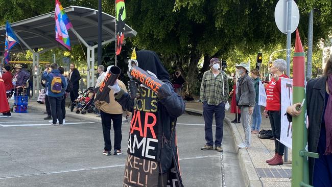 Anti-war protesters from the Disrupt Land Forces group in South Bank this morning.