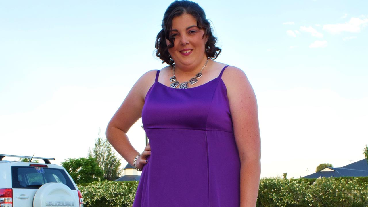 Taleisha Ferguson is all smiles in this beautiful gown at the Roma State College formal. Photo Tom Gillespie / The Western Star