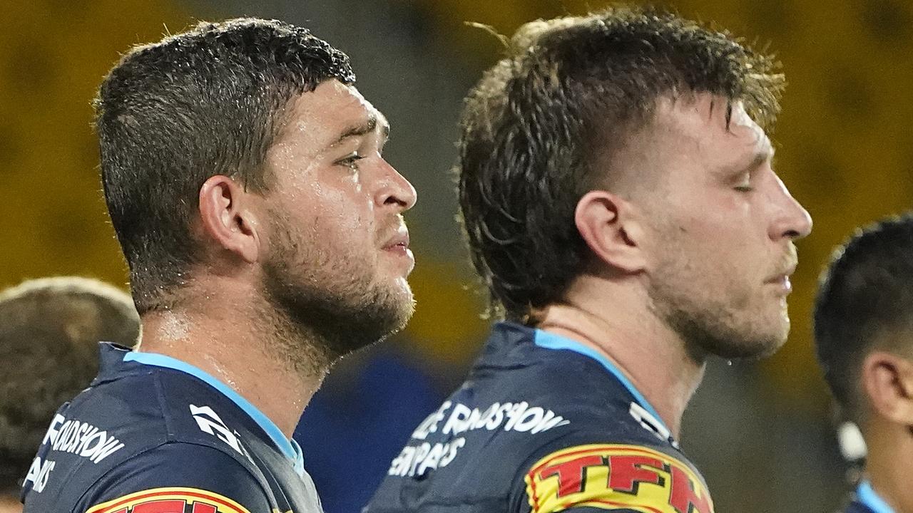 Titans player Ash Taylor (left) and Jai Arrow.