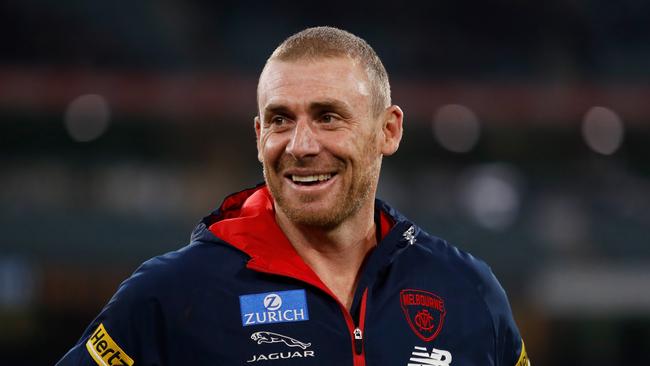 MELBOURNE, AUSTRALIA - APRIL 24: Simon Goodwin, Senior Coach of the Demons looks on after a win during the 2022 AFL Round 06 match between the Richmond Tigers and the Melbourne Demons at the Melbourne Cricket Ground on April 24, 2022 in Melbourne, Australia. (Photo by Dylan Burns/AFL Photos via Getty Images)
