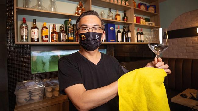 Chinatown is gradually reopening, and restaurant owners such as Jovian Soo, who runs One Point in Waratah Place, couldn’t be happier. Picture: Mark Stewart