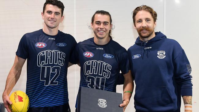 GEELONG, AUSTRALIA - MAY 27: Mark O'Connor, Oisin Mullin and Zach Tuohy of the Cats pose ahead of Mullin's debut game during the round 11 AFL match between Geelong Cats and Greater Western Sydney Giants at GMHBA Stadium, on May 27, 2023, in Geelong, Australia. (Photo by Morgan Hancock/AFL Photos/via Getty Images)