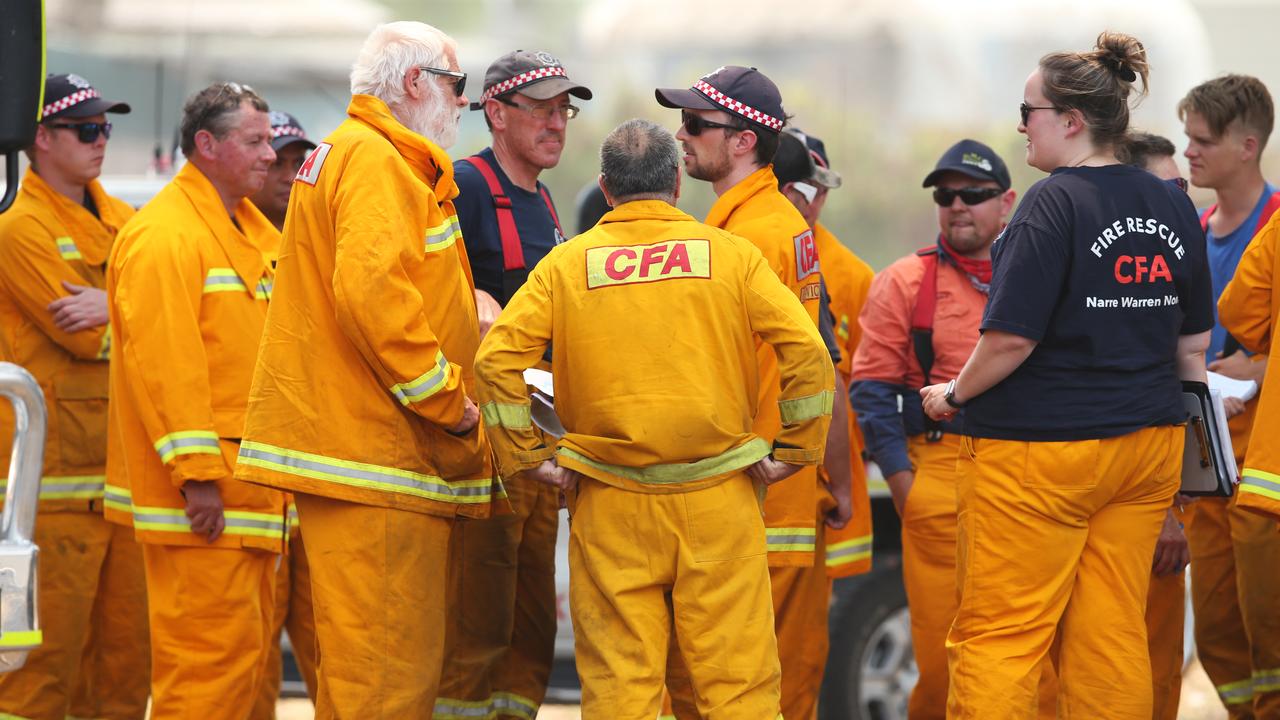 Firefighters hold a briefing in Bruthen. Picture: David Crosling