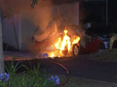 Magney street in Woollahra where a car was set alight and Israel graffiti was sprayed on garage walls.