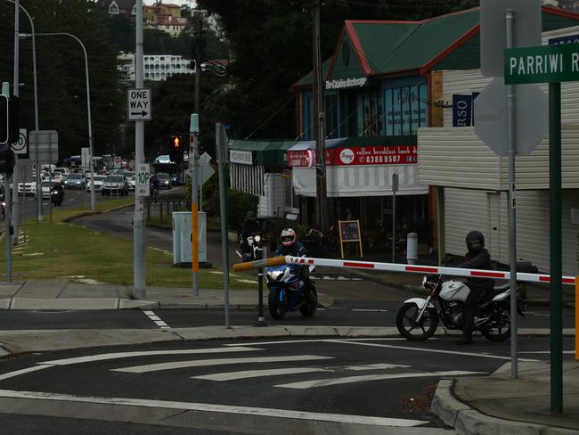 A motorcyclist on approach takes advantage of the one-way lane next to the unauthorised yellow extension on the boom gate during morning peak hour earlier this month. Picture: Annika Enderborg