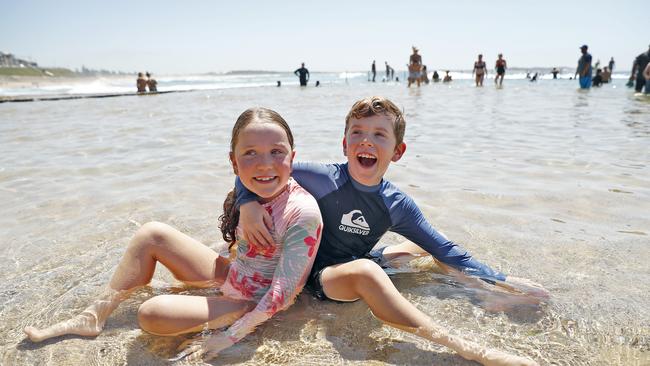 Enjoying the warm weather in the Sutherland Shire today, James Powney and sister Kayla take a dip Cronulla’s rock pools. Picture: Sam Ruttyn