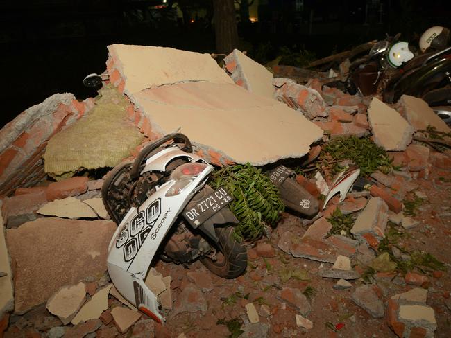 Bikes are seen covered in debris at a mall in Bali's capital Denpasar. Picture: AFP