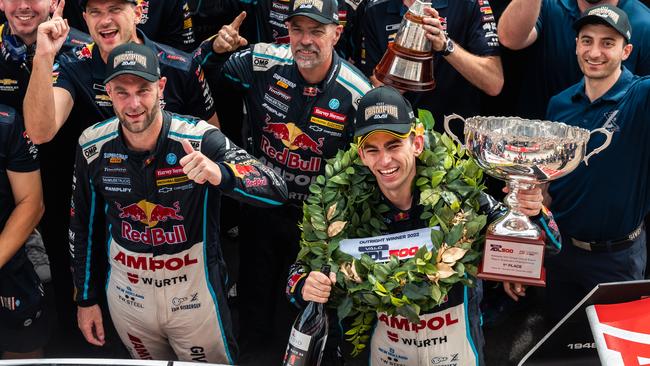 Shane van Gisbergen and Broc Feeney celebrate with their team following the Adelaide 500. Picture: Daniel Kalisz/Getty Images