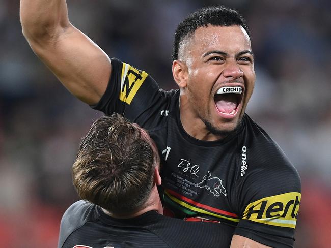 *2021 Getty Images Best of Sport Australia* - BRISBANE, AUSTRALIA - OCTOBER 03:  Stephen Crichton of the Panthers celebrates with Paul Momirovski of the Panthers after winning the 2021 NRL Grand Final match between the Penrith Panthers and the South Sydney Rabbitohs at Suncorp Stadium on October 03, 2021, in Brisbane, Australia. (Photo by Bradley Kanaris/Getty Images)