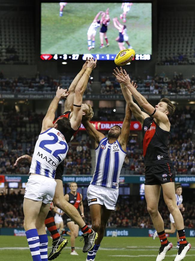 Andrew Phillips of the Bombers attempts to mark the ball during the round 10 AFL match between the Essendon Bombers and the North Melbourne Kangaroos at Marvel Stadium on May 23, 2021 in Melbourne, Australia. (Photo by Darrian Traynor/Getty Images)