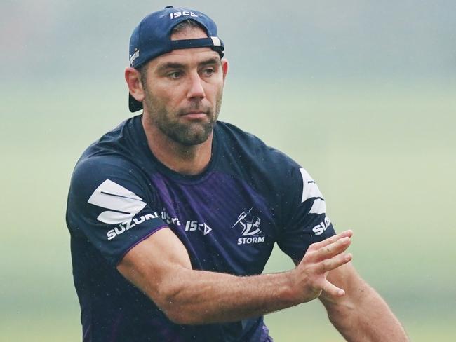 Cameron Smith of the Storm passes the ball during a Melbourne Storm training session at Gosch's Paddock in Melbourne, Monday, January 6, 2020. (AAP Image/Michael Dodge) NO ARCHIVING, EDITORIAL USE ONLY