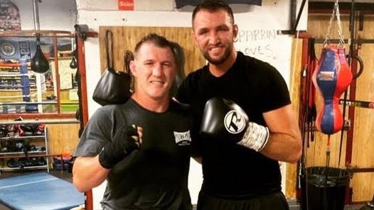 Rugby league great Paul Gallen (left) has been sparring in England with that country's heavyweight boxing champion Hugh Fury.