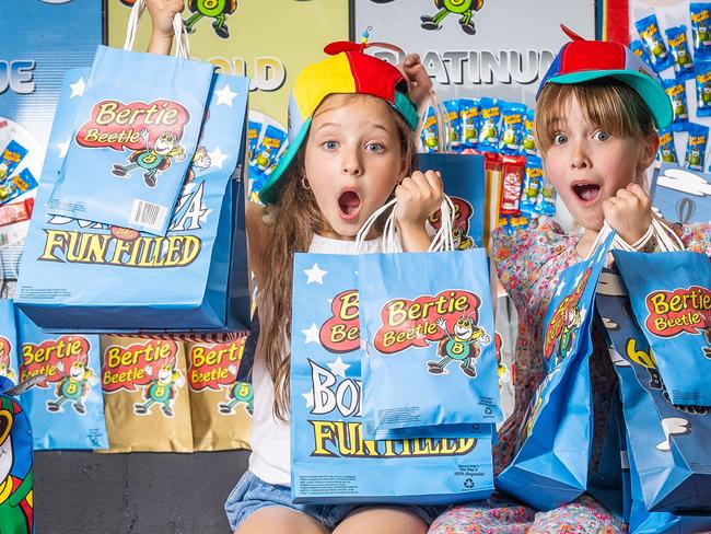 The Bertie Beetle showbag is celebrating 60 years. Mia Owen (8) and Mila Forsdick (9). Picture: Jake Nowakowski