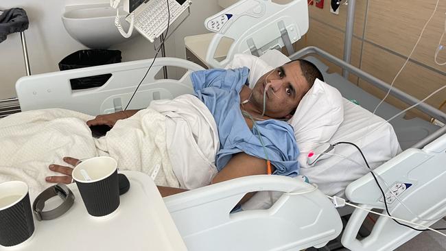 Harshpal Sharma, 35 in Royal Adelaide Hospital the security guard who was stabbed after confronting a gang of alleged teenage shoplifters at City Cross Arcade Picture: Evangeline Polymeneas