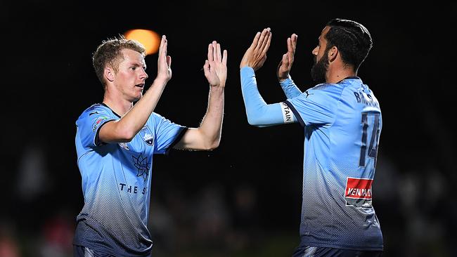 Trent Buhagiar celebrates with Alex Brosque.