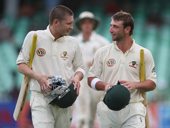 Michael Clarke and Phil Hughes leave the field together during a test against South Africa in 2009. Picture: Getty Images