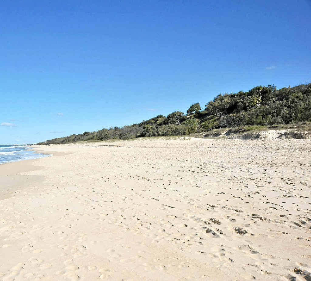 CALM BEFORE STORM: The beach at Yaroomba at the end of Warragah Pde and (below) one of the design concepts which looks very much like the Marina Bay Sands Casino in Singapore. Picture: Brett Wortman