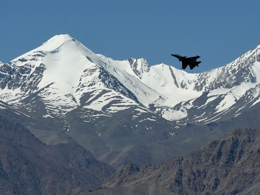 An Indian fighter jet flies over a mountain range near Leh, the joint capital of the union territory of Ladakh in June. Picture: Tauseef Mustafa / AFP