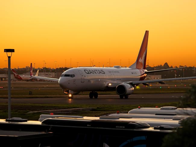 Qantas customers could soon receive flight vouchers or frequent flyer points if they’ve been vaccinated against Covid-19. Picture: NCA NewsWire / Dylan Coker