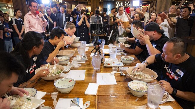 Competitors chow down pho at last year’s finale. Picture: Cabra-Vale Diggers