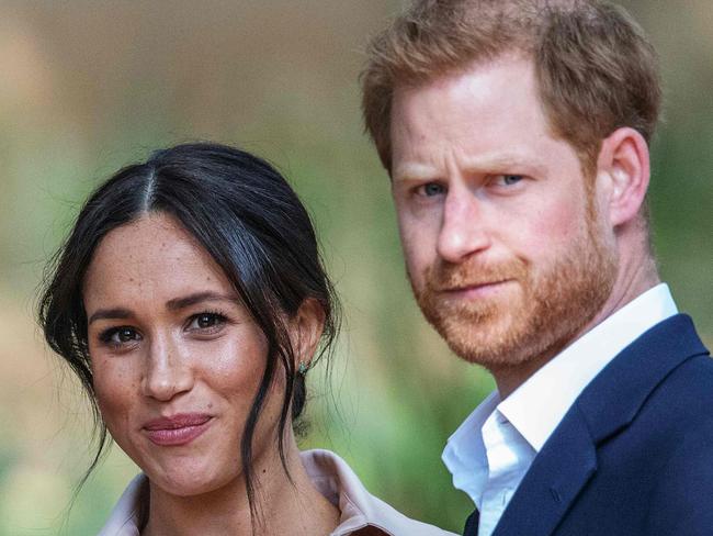 (FILES) In this file photo taken on October 02, 2019 Britain's Prince Harry, Duke of Sussex(R) and Meghan, the Duchess of Sussex(L) arrive at the British High Commissioner residency in Johannesburg. - A British newspaper group on Tuesday won a ruling to amend its defence against a high-profile claim by Meghan Markle for breach of privacy and copyright. The former television actress is suing Associated Newspapers over the publication of extracts of a letter she wrote to her estranged father before her wedding to Prince Harry in 2018. (Photo by Michele Spatari / AFP) / France OUT until 2019-10-17T00:00:00.000+02:00