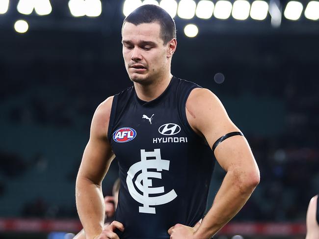 MELBOURNE, AUSTRALIA - JUNE 11: Jack Silvagni of the Blues looks dejected after a loss during the 2023 AFL Round 13 match between the Carlton Blues and the Essendon Bombers at the Melbourne Cricket Ground on June 11, 2023 in Melbourne, Australia. (Photo by Dylan Burns/AFL Photos via Getty Images)