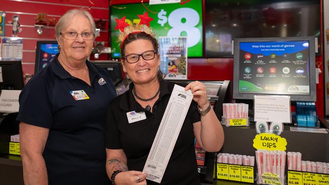 Kathleen Rob and Store manager Kelly Moran celebrate selling Saturday's Division 1 jackpot ticket. Picture Emily Barker.