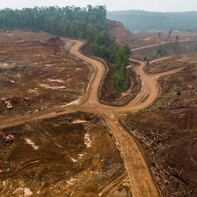 Excavators gather soil containing nickel ore at a mining site operated by PT Hengjaya Mineralindo Nickel Mine Project on February 8, 2024, in Morowali, Central Sulawesi, Indonesia. Picture: Garry Lotulung