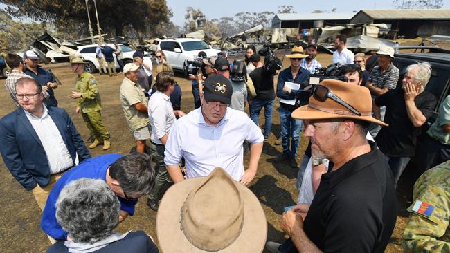 Prime Minister Scott Morrison meets locals on Kangaroo Island following the devastating bushfire. Picture: David Mariuz/AAP