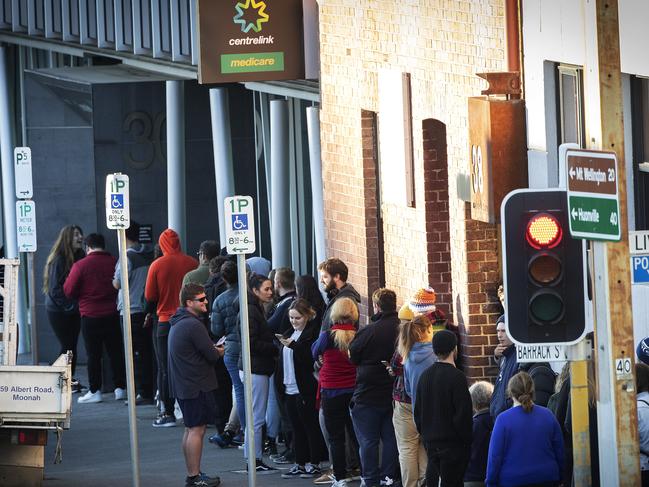 People line up outside the Centrelink office at Hobart. Picture Chris Kidd