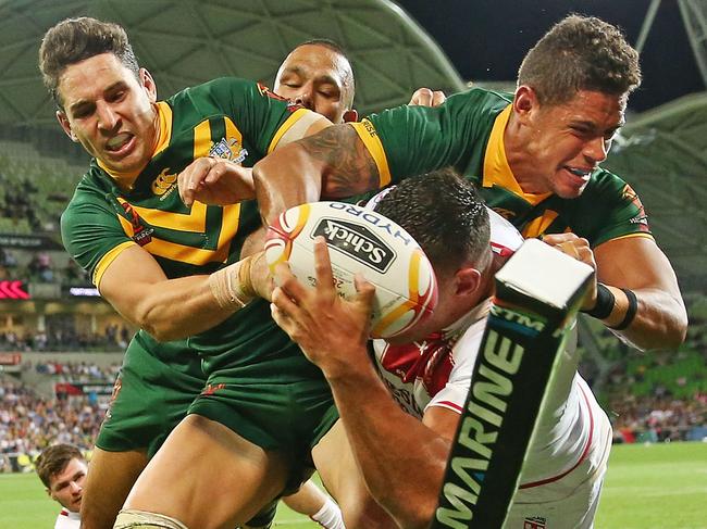 MELBOURNE, AUSTRALIA - OCTOBER 27:  Billy Slater and Dane Gagai of the Kangaroos perform a try saving tackle as Ryan Hall of England attempts to score a  try in the corner during the 2017 Rugby League World Cup match between the Australian Kangaroos and England at AAMI Park on October 27, 2017 in Melbourne, Australia.  (Photo by Scott Barbour/Getty Images)