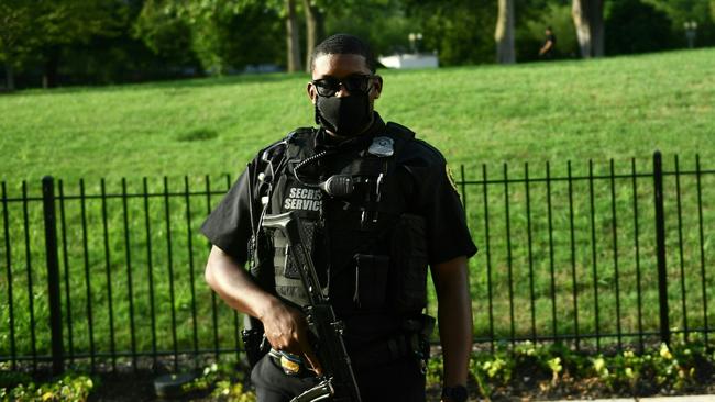 A member of US Secret Service's Counter Assault Team stands outside the Brady Briefing Room of the White House in Washington. Picture: Brendan Smialowski/AFP)