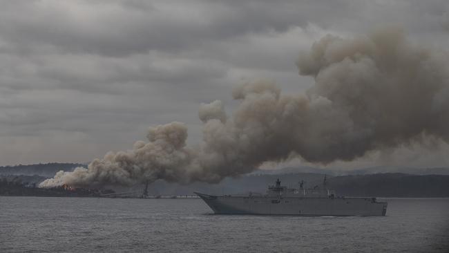 HMAS Adelaide arrives in Eden on Monday morning. Picture: Gary Ramage