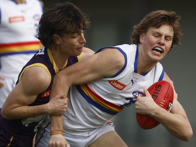 MELBOURNE, AUSTRALIA - AUGUST 05: Josh Smillie of the Ranges is tackled by Kynan Brown of the Chargers during the round 15 Coates Talent League Boys match between Oakleigh Chargers and Eastern Ranges at Warrawee Park on August 05, 2023 in Melbourne, Australia. (Photo by Daniel Pockett/AFL Photos/via Getty Images)