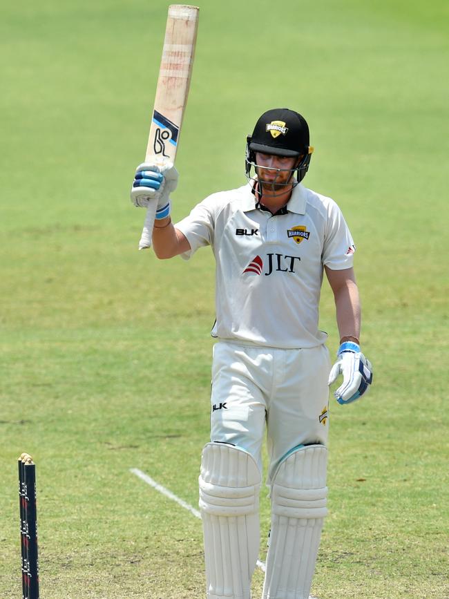 Will Bosisto celebrates bringing up his 150 for Western Australia against Queensland last year. Picture: DARREN ENGLAND (AAP).