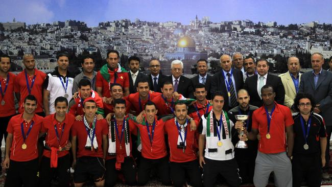 The Palestinian team meet with president Mahmud Abbas.