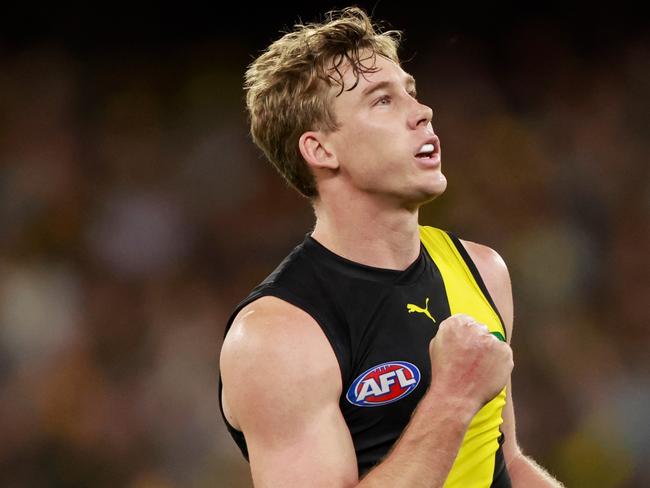 MELBOURNE, AUSTRALIA - MARCH 16: Tom Lynch of the Tigers celebrates a goal during the 2023 AFL Round 01 match between the Richmond Tigers and the Carlton Blues at the Melbourne Cricket Ground on March 16, 2023 in Melbourne, Australia. (Photo by Dylan Burns/AFL Photos via Getty Images)