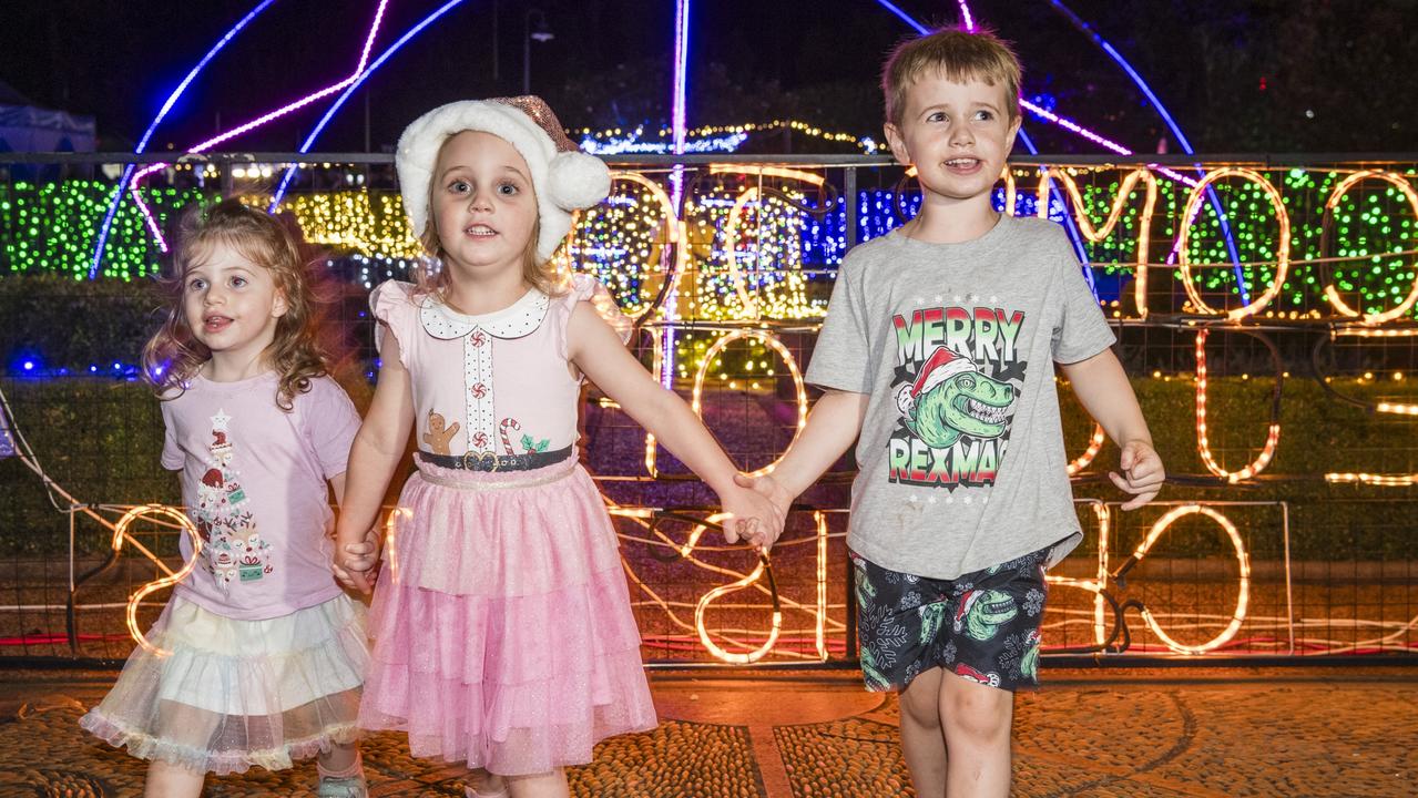 Enjoying Toowoomba's Christmas Wonderland are (from left) Aria Templeman, Aubrey Allen and Tane Templeman at the annual Christmas lights display in Queens Park, Saturday, December 2, 2023. Picture: Kevin Farmer